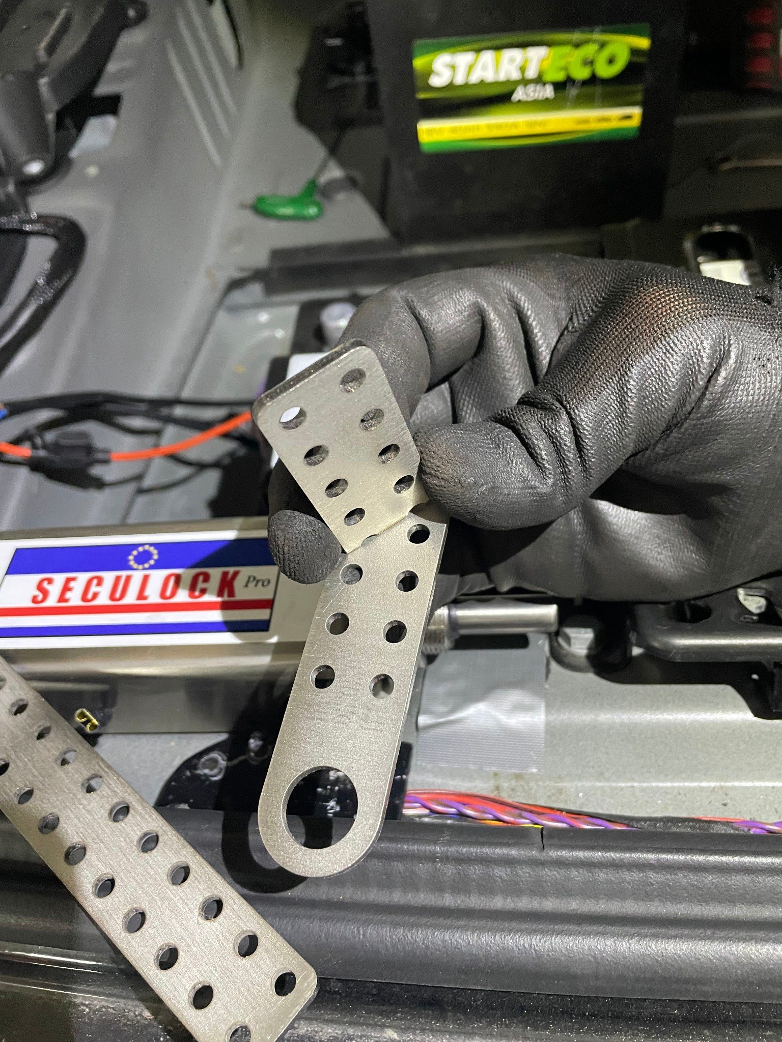 Seculock Pro stainless-steel installation brackets during fitting